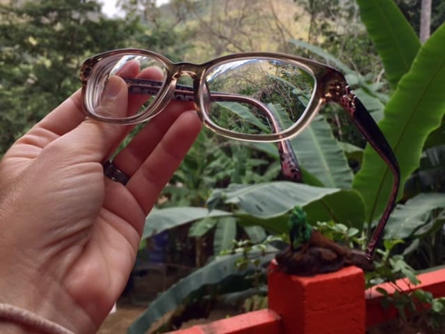 New eyeglasses in Mexico - good lenses in a brown plastic frame.
