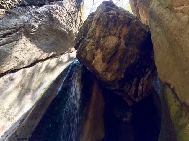 Boulder at Tzununa waterfall at Lake Atitlan