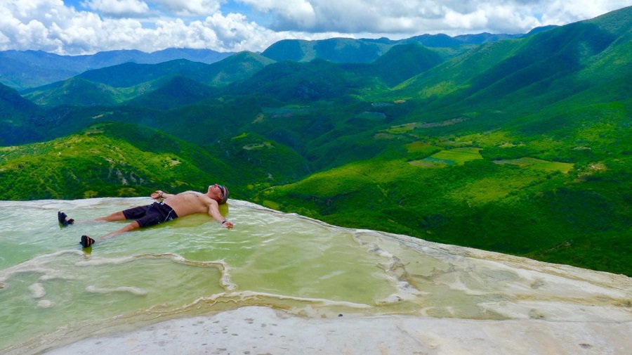 overachiever relaxes in the infinity pool at Hierve el Agua in Oaxaca
