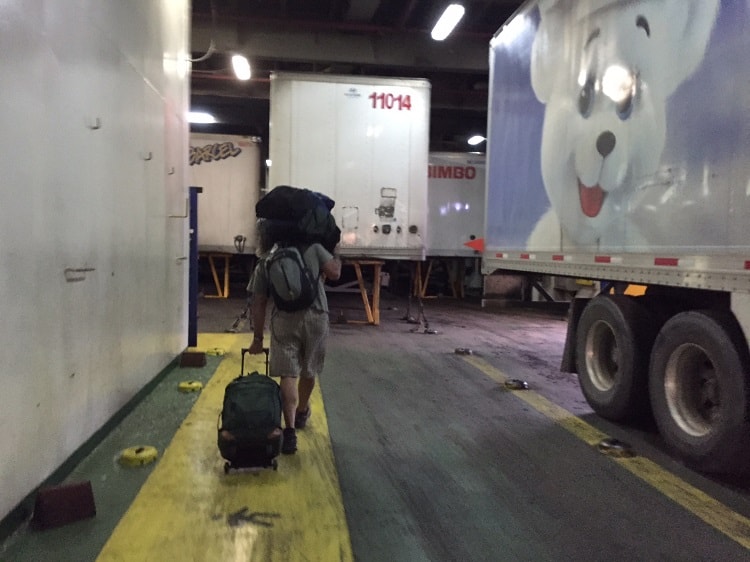 Theo carries all of our bags onto the Baja Star ferry.