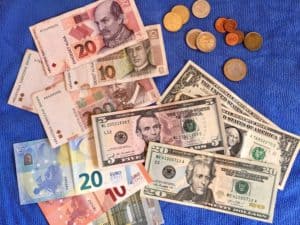 early retirement travel means different currencies and money strategies