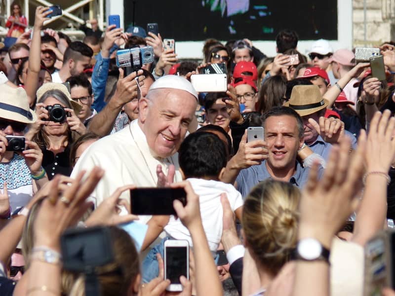 Pope Francis greets pilgrims and children at St. Peter's Square
