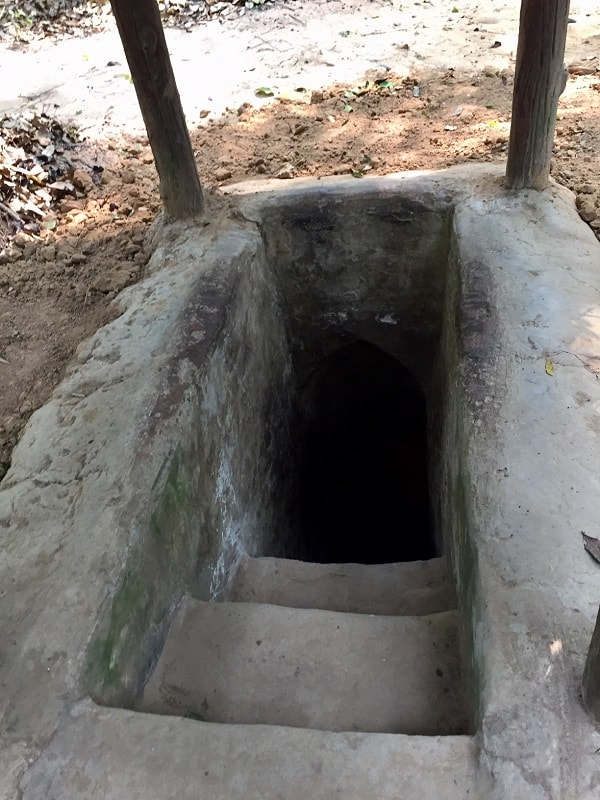an entrance to the cu chi tunnels from above ground