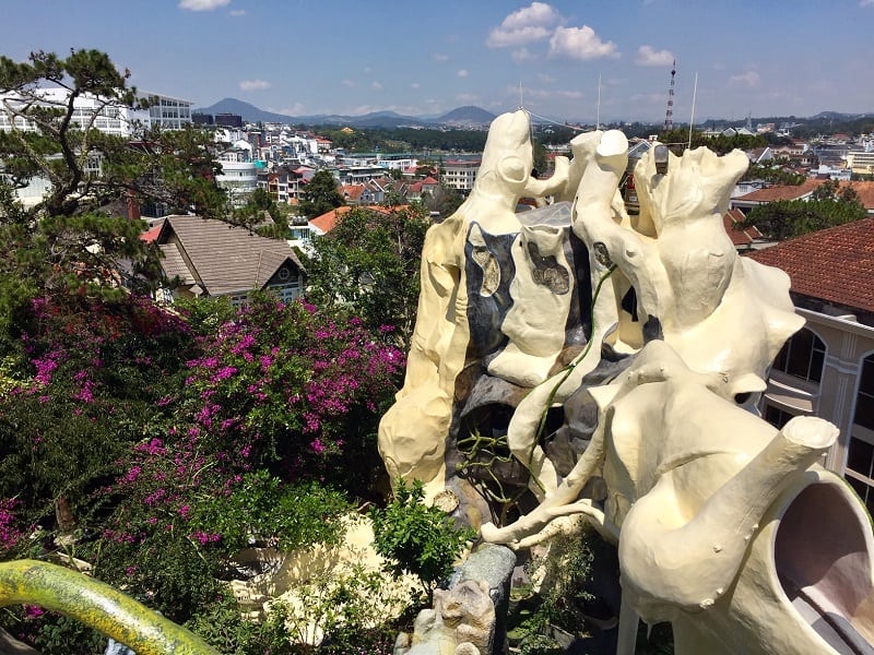 the bizarre facade of the dalat crazy house almost looks like the style of gaudi from spain