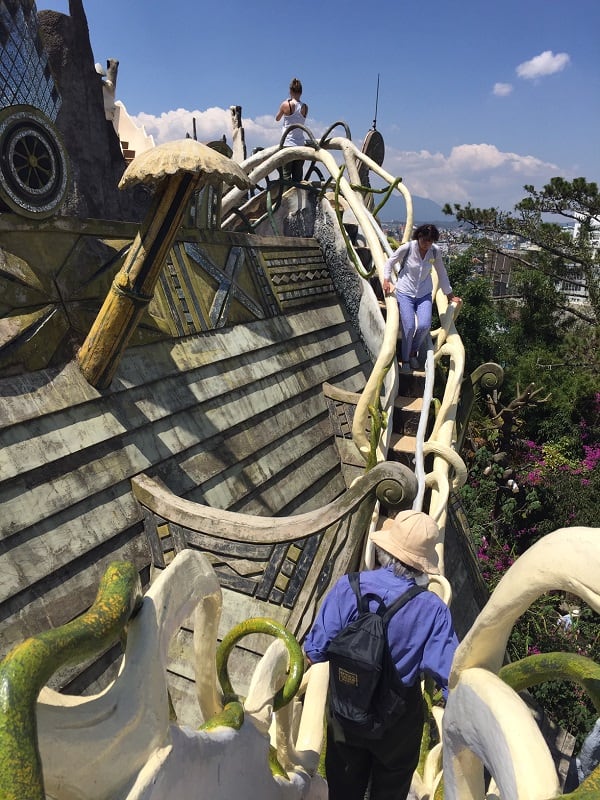 an outdoor staircase near the roof at the dalat crazy house