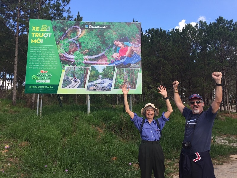 a mom and her son give their approval of the dalat roller coaster