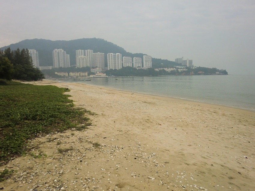 smokey horizon on penang island in malaysia from deforestation in southeast asia