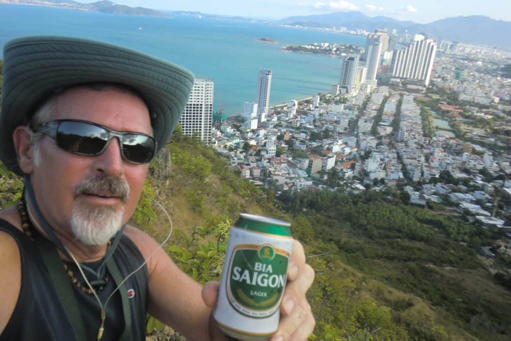 southeast asia beer report man holding can of vietnamese beer