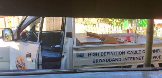 view of a cable truck through a window on philippine quarantine day 14