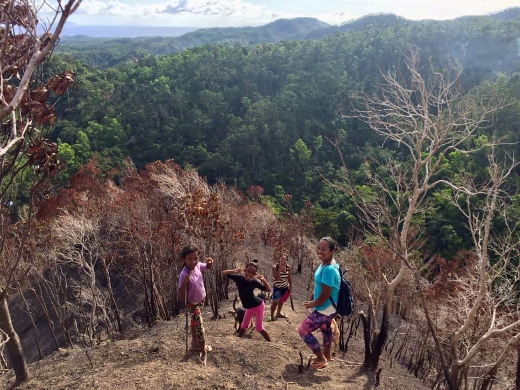 indigenous ati people on a steep mountainside