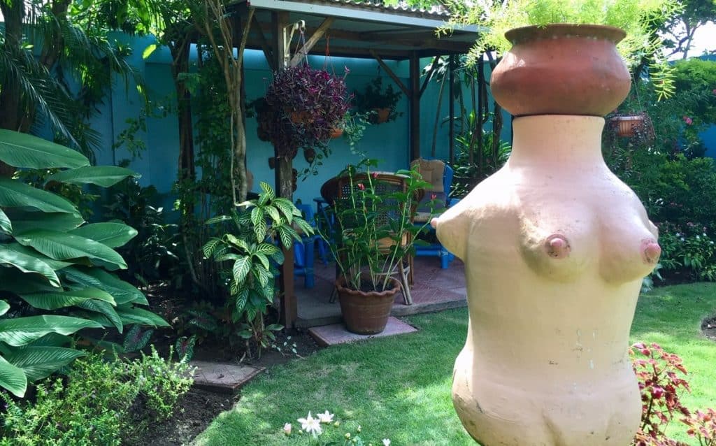 A garden planter with three sets of breasts in a private backyard in Aklan Province, Philippines.