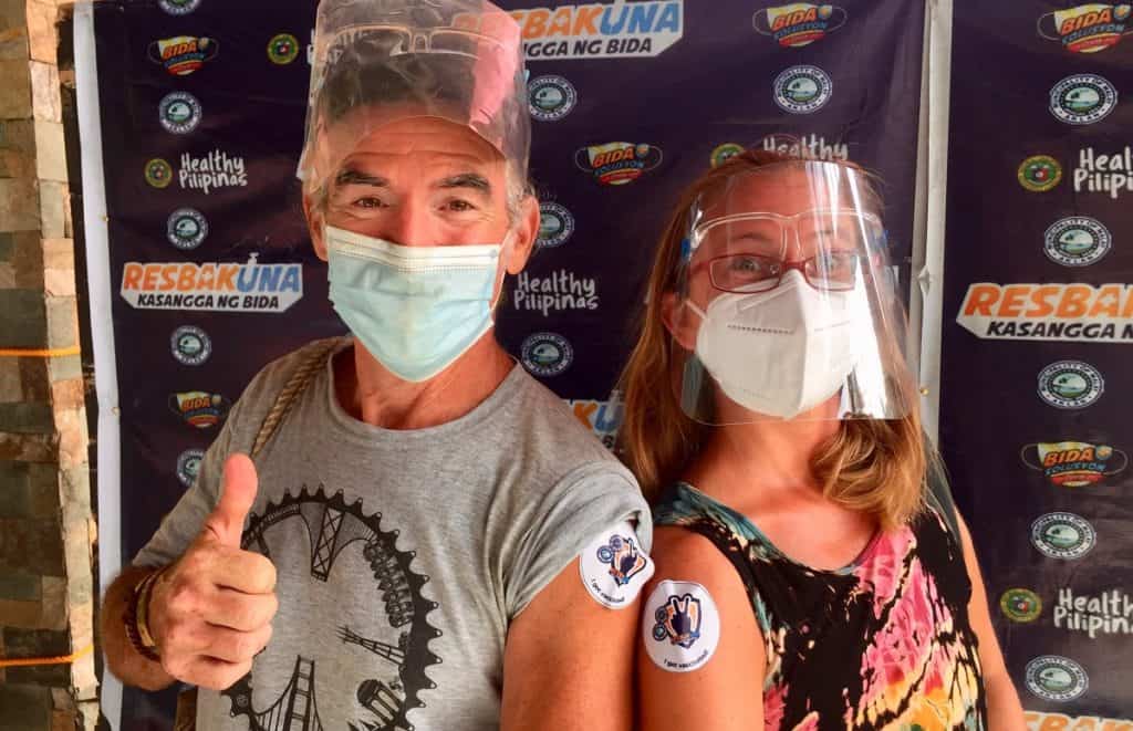 Theo and Ellen after they got coronavirus jabs in the Philippines.
