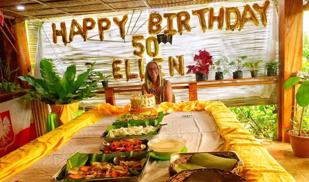 ellen at the talbe yolly prepared for ellen's 50th birthday