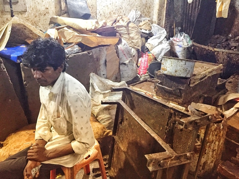 A soap worker in Dharavi slum in Mumbai.
