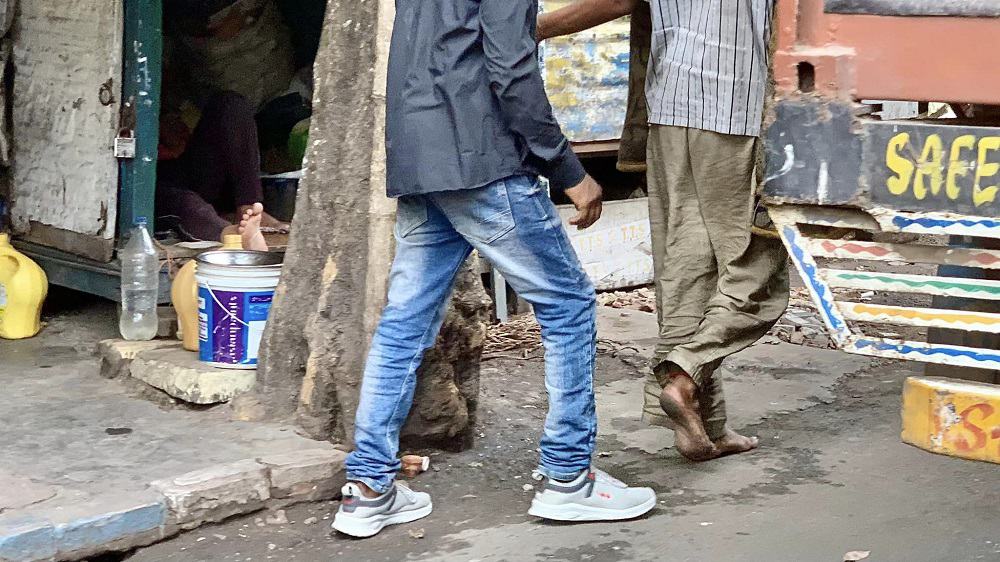 another barefoot man in kolkata, india