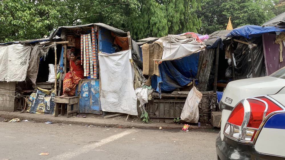 woman in shanty in kolkata, india